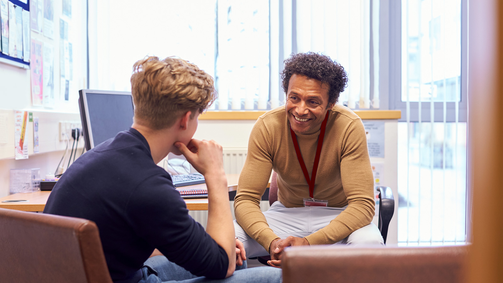 Professor mentoring a student during office hours