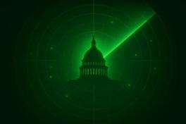 Silhouette of U.S. Capitol building with green glow behind and a green radar signal around thebuilding