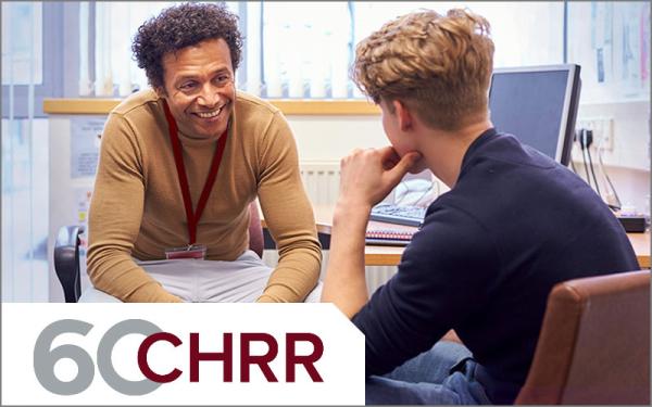Staff mentoring a student